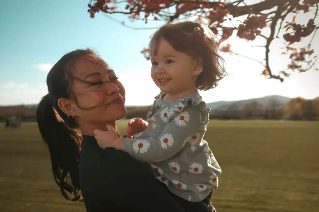 A photo of my wife and youngest daughter shot on the Fujifilm X100VI camera with a Tiffen black mist 1/8 strength filter. 