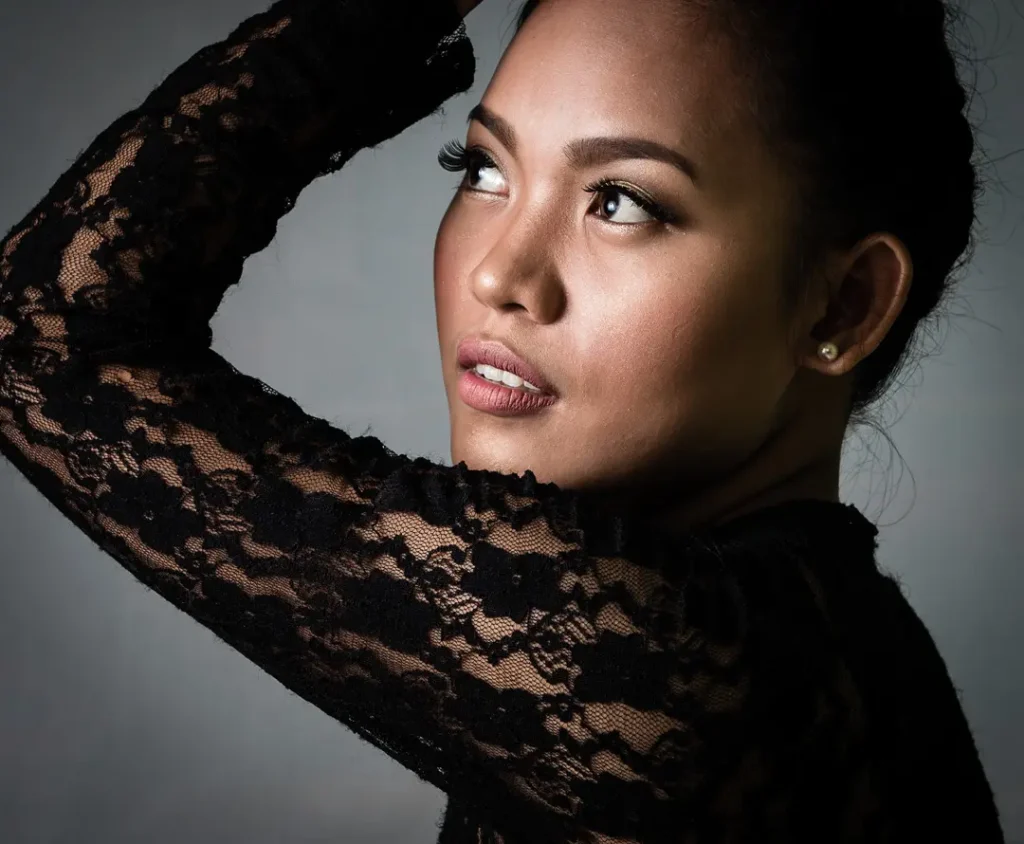 a studio portrait of an exceptionally beautiful Filipina taken on the Olympus OM-5 II Micro 43 camera. 