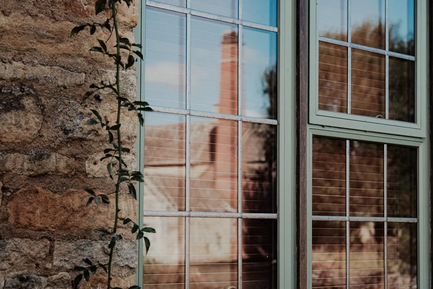A reflection of the watermill in Lower Slaugter in the Cotswolds. Photo is taken on the Fujifilm XF 50mm f/2 lens.