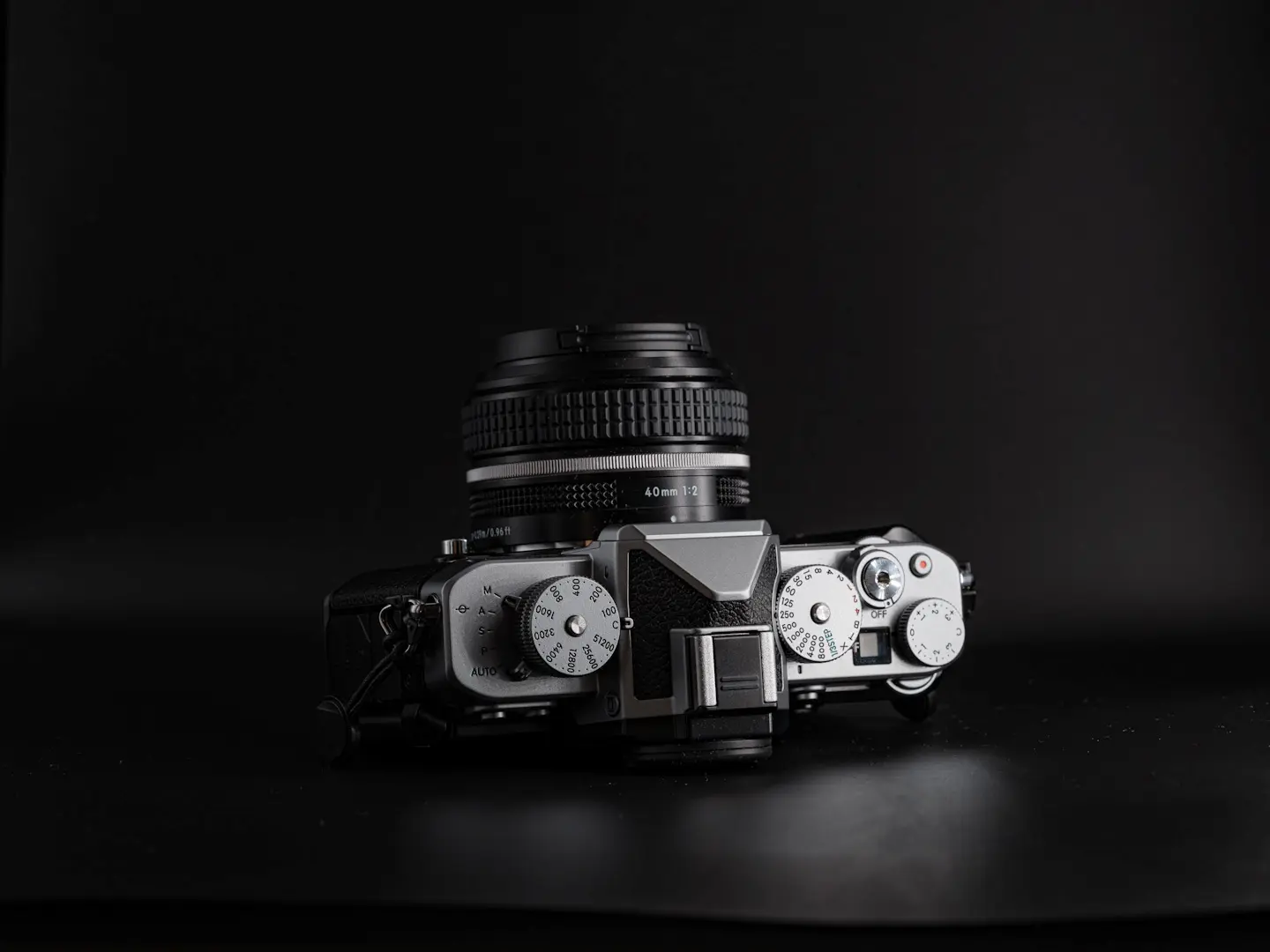 Top view of the Nikon ZF camera showing all the dials and settings buttons.