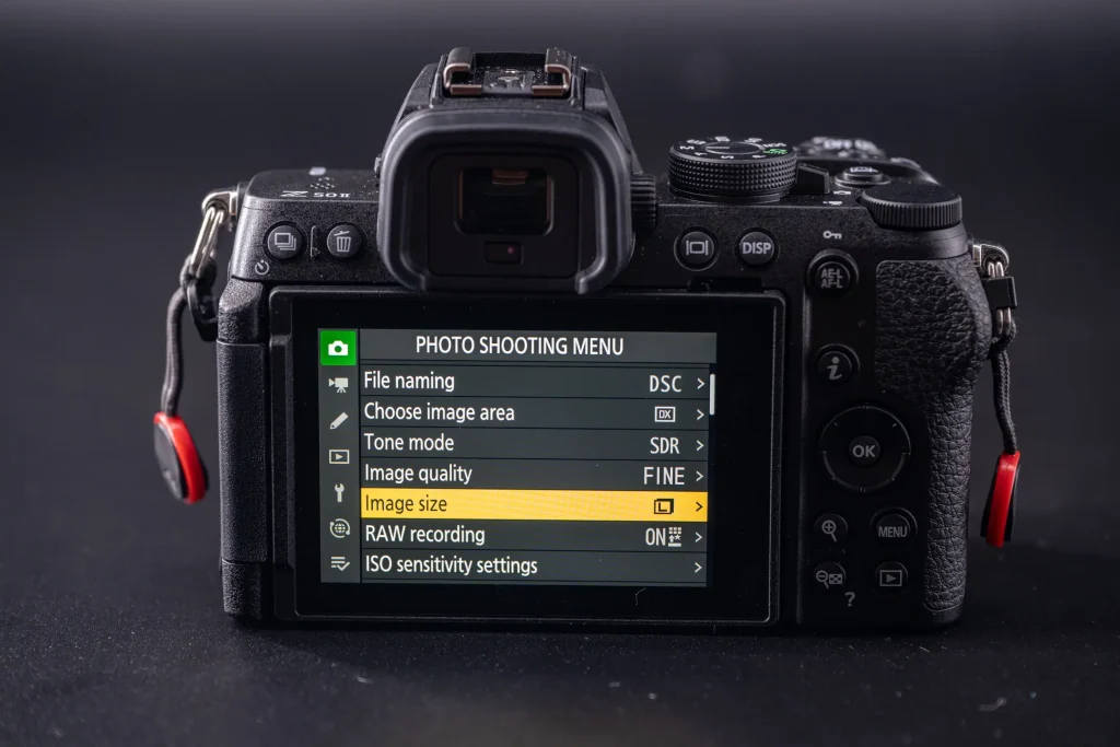 The rear of the Nikon Z50II camera showing the Photo shooting menu with the image size option highlighted.